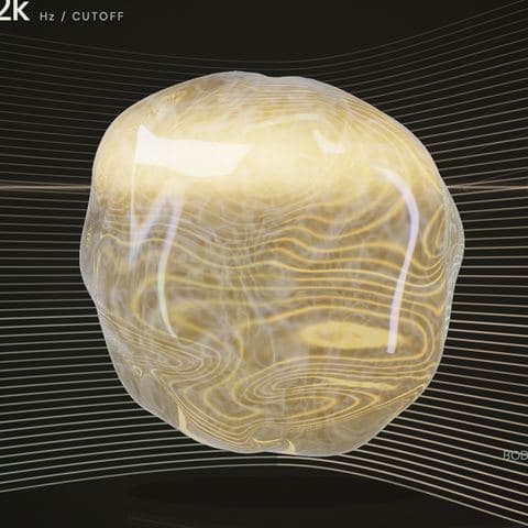 The orb in Ambrosia: a clear, honey-gold body with slow swirls inside it.