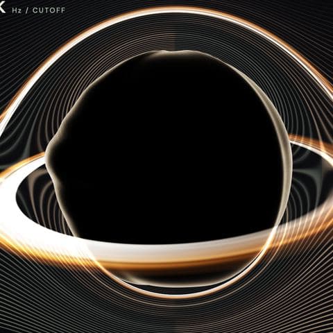 The orb in Void: a black disc ringed by a bent band of orange light, like a lens around a dark center.